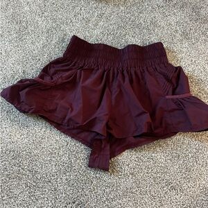 Women's Ruffle Hem Athletic Shorts in Burgundy